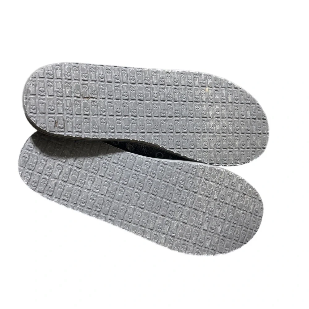Sanuk slip sidewalk